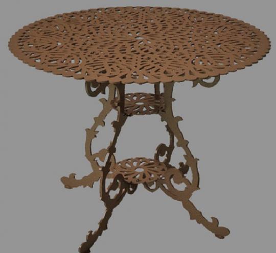 Круглый стол, украшенный резьбой